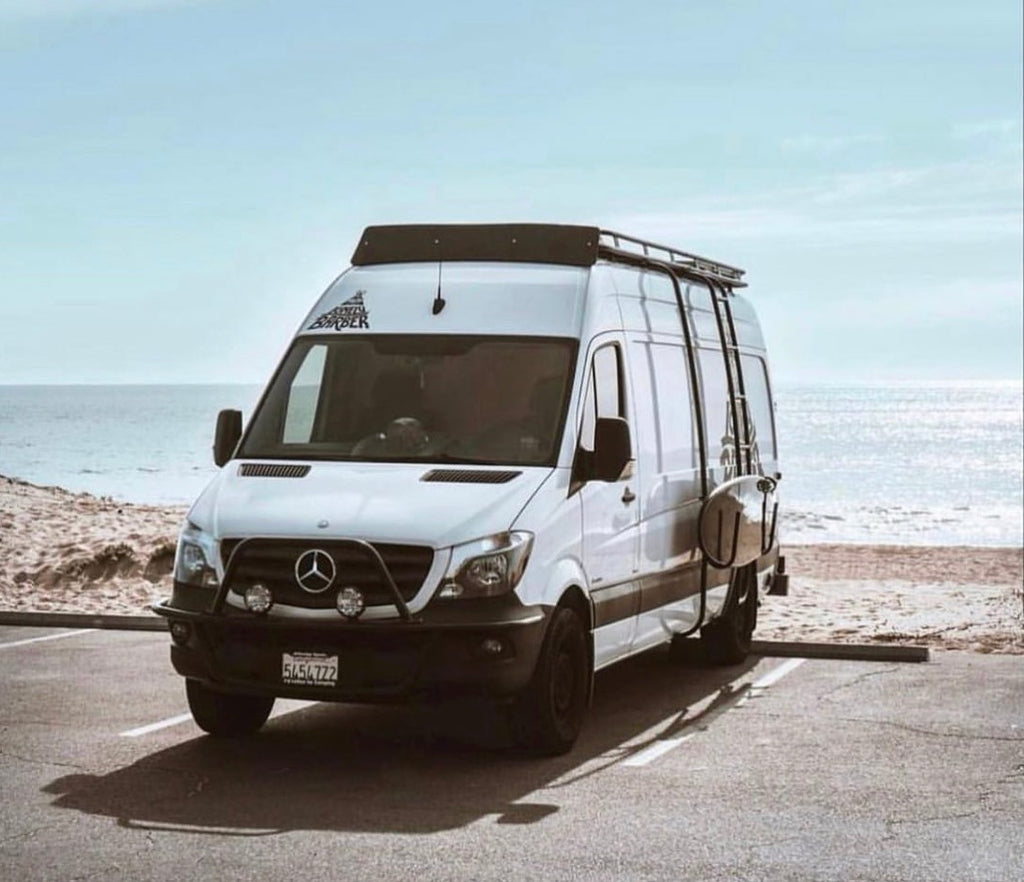 Mercedes Sprinter 56" x 12" fairing with a reverse smile and Aluminess roof rack