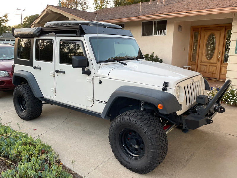 Jeep Wrangler with a custom fairing 54" x 7" and a reverse smile shape